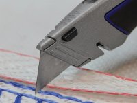 Faithfull Heavy-Duty Trimming Knife Blades (Box 100) in safe storage dispenser