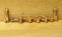 Hand carved - bone shaped - Button