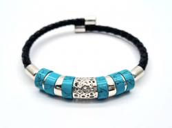 Created Turquoise Leather Torque Bangle