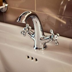 Roca Carmen Twin-Lever Basin Mixer Tap with Press Down Waste