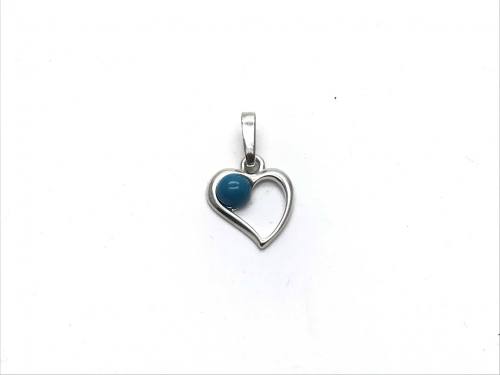 Silver Reconstituted Turquoise Shaped Pendant